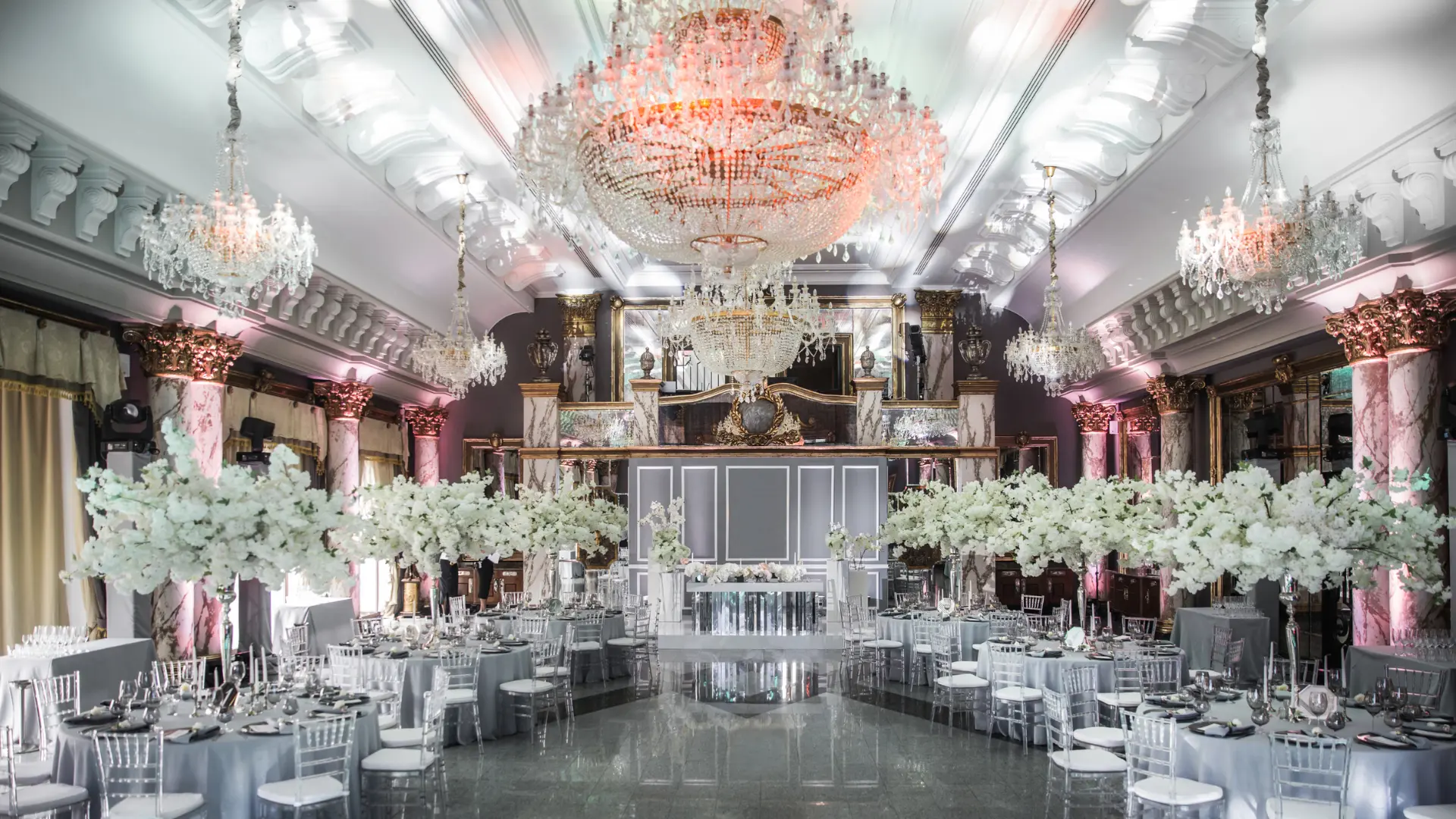 The Grand Ballroom interior with chandeliers and luxury seating